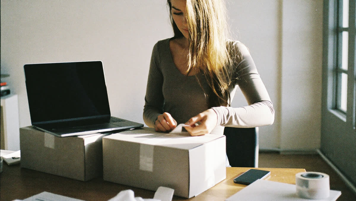 Online store founder packing orders